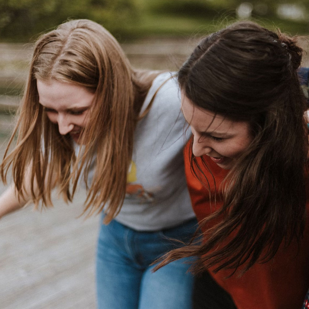 Two women smiling